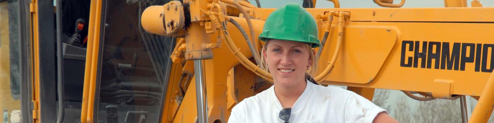 Woman heavy equipment operator construction worker
